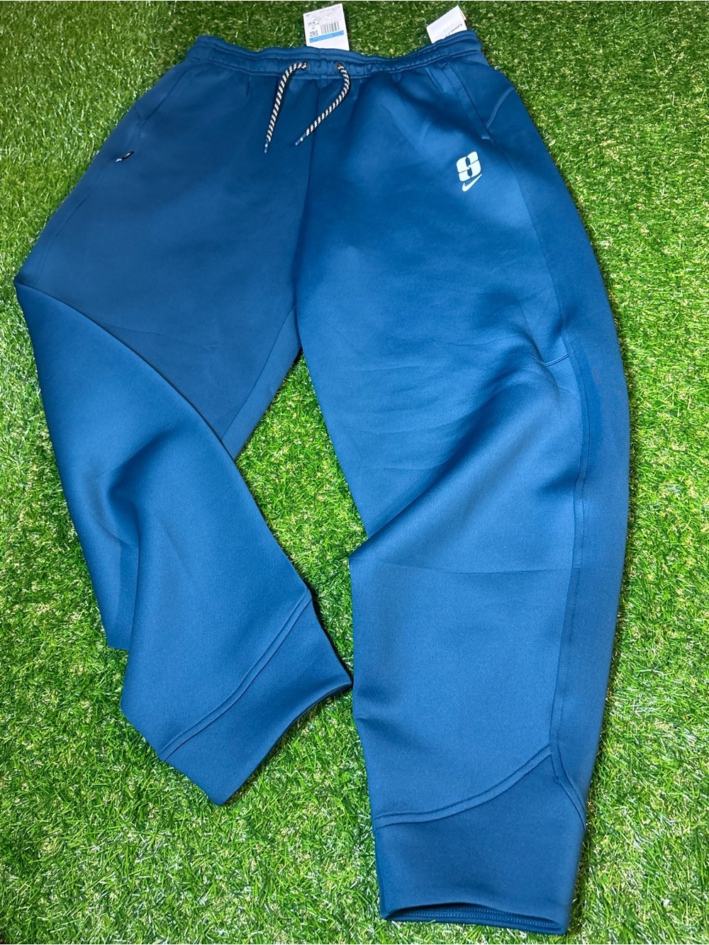 Nike WNBA Sabrina Performance Joggers - Blue retail is $100.